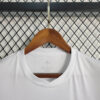 2023/2024 Real Madrid Reflective Balmain White Football Shirt detail view